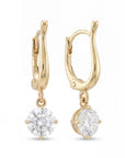 Gold earrings with diamonds on a white background