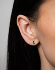 Oval Bezel Set Emerald Stud Earrings - Skeie's Jewelers