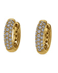 Gold hoop earrings with diamond accents on a white background front view