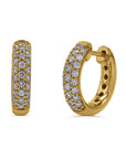 Gold hoop earrings with pave diamond accents on a white background