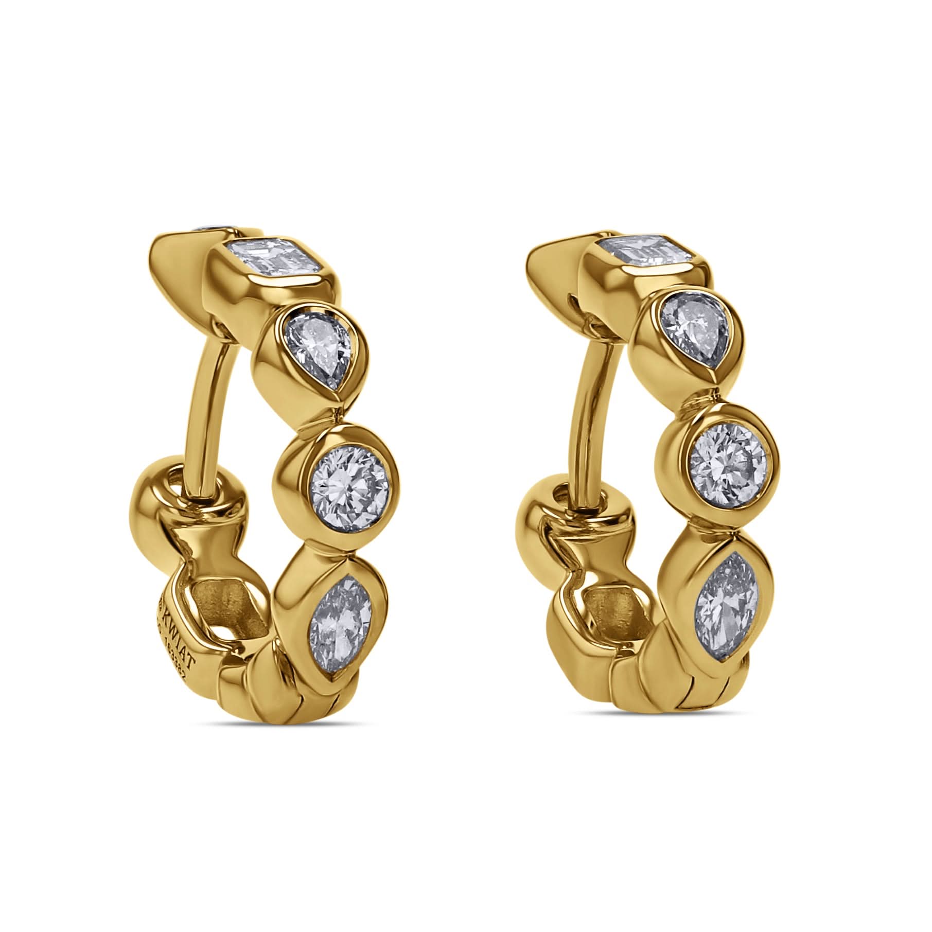 Gold hoop earrings with diamond stones on a white background