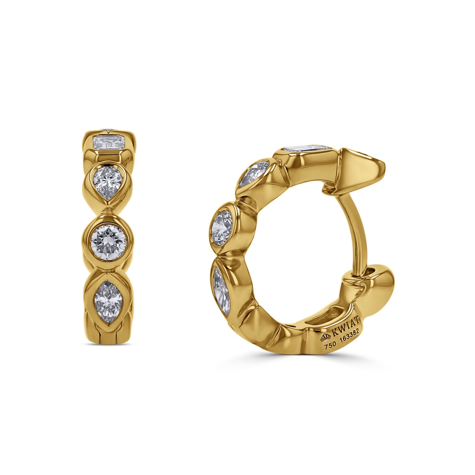 Gold hoop earrings with embedded diamonds on a white background angled