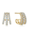 Gold earrings with diamond accents on a white background