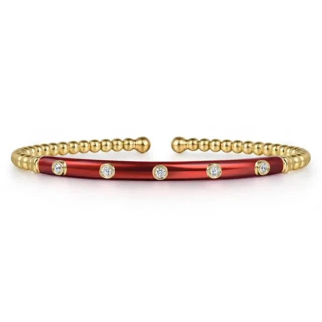 Bracelet with red and gold sections on a white background