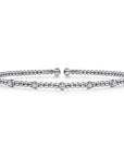 White gold bracelet with beads and diamonds on a white background