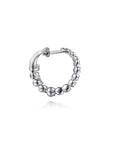 backside of white gold hoop earring on a white background