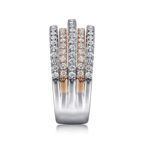 Diamond-studded ring with rose gold and silver accents on a white background