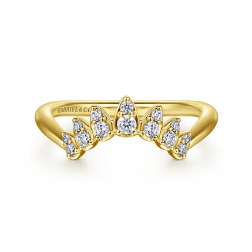 A delicate 14k yellow gold curved diamond anniversary band by Gabriel & Co., showcasing a continuous row of shared-prong pavé diamonds totaling 0.20 carats.