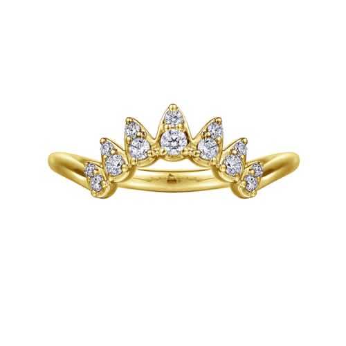 Gold ring with diamond accents on a white background