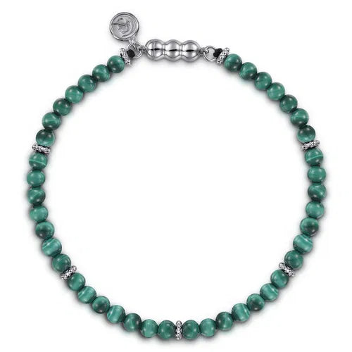 Green 4mm beaded bracelet with silver clasp on a white background