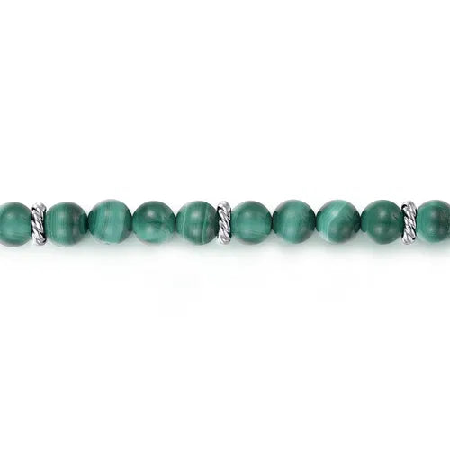Green 6mm beaded bracelet with silver clasps on a white background