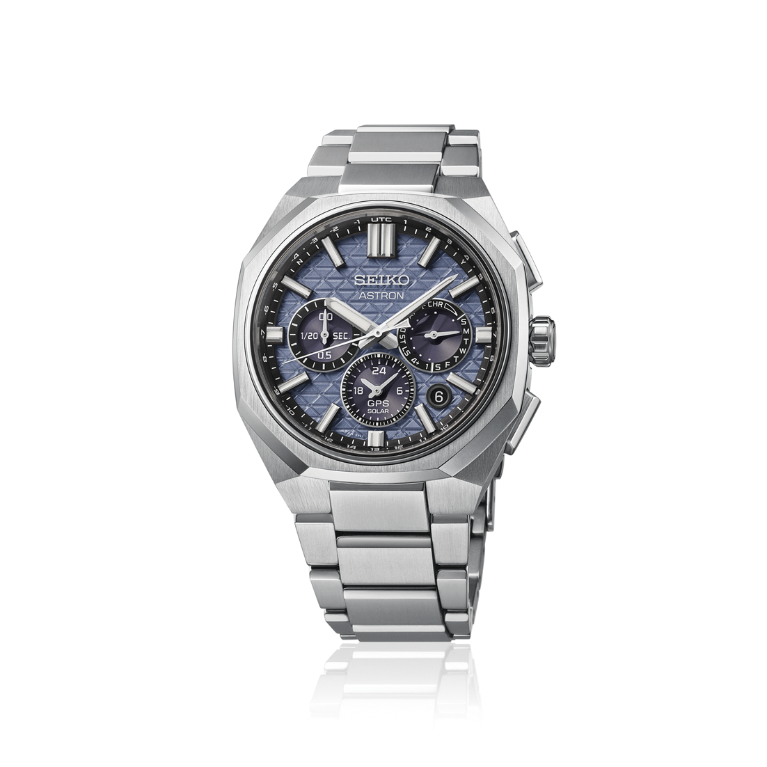 Silver Seiko watch with a blue face on a white background facing