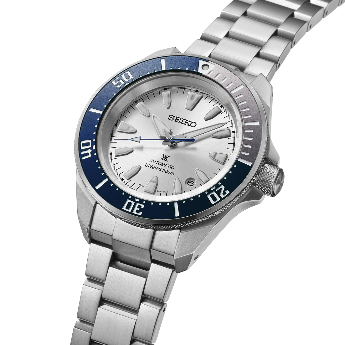 An angled close up  view of the Seiko Prospex 145th Anniversary Limited Edition watch HBB001 showcasing a sharp stainless steel case, a silver-white dial with a date window, a two-tone unidirectional bezel with blue accents, a blue seconds hand, and a solid stainless steel link bracelet on a white background.