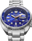 Seiko watch with blue dial and silver metal bracelet on a white background CLOSE UP ANGLED