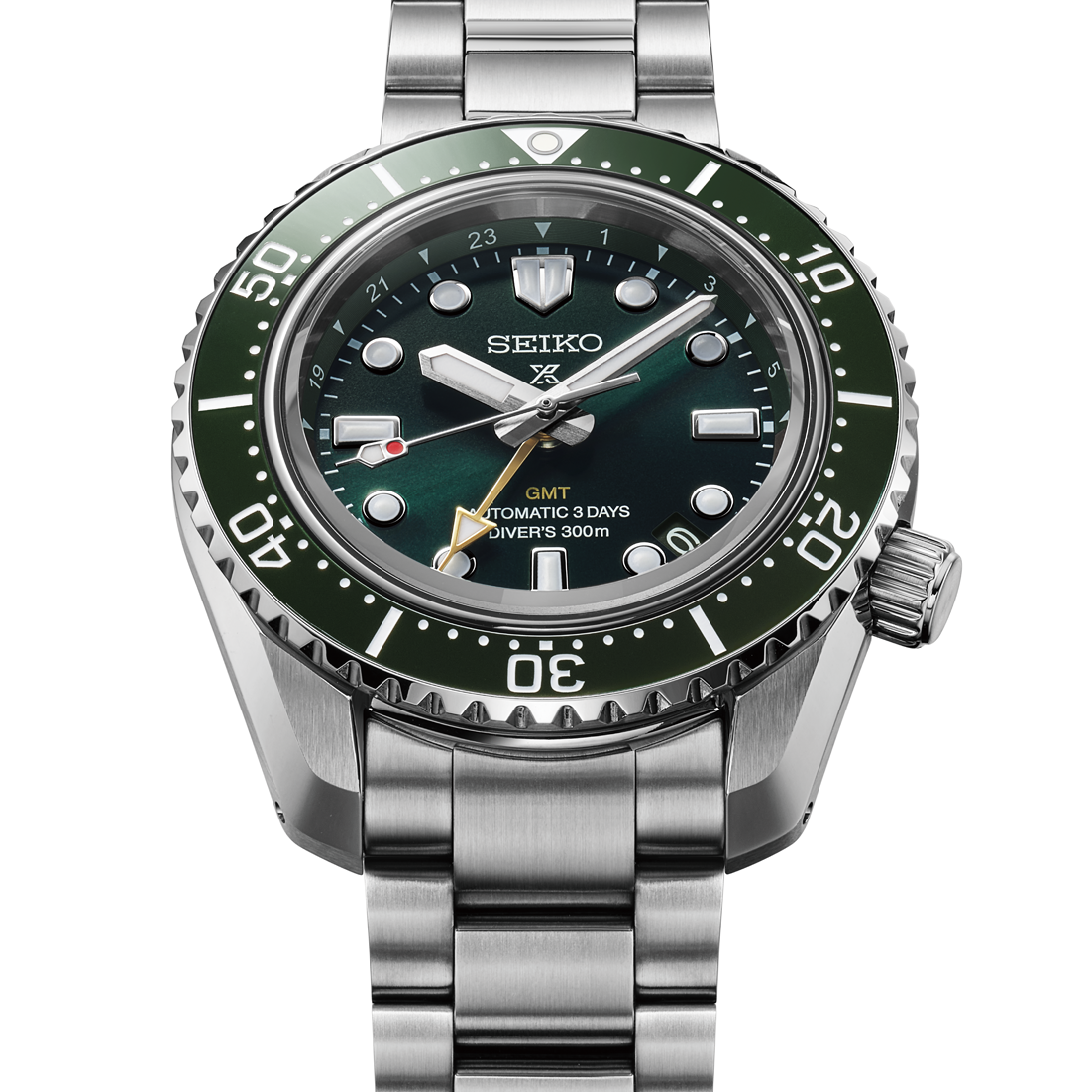 Seiko watch with green bezel and silver bracelet on a white background tilted up view