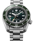 Seiko watch with green bezel and silver bracelet on a white background tilted up view