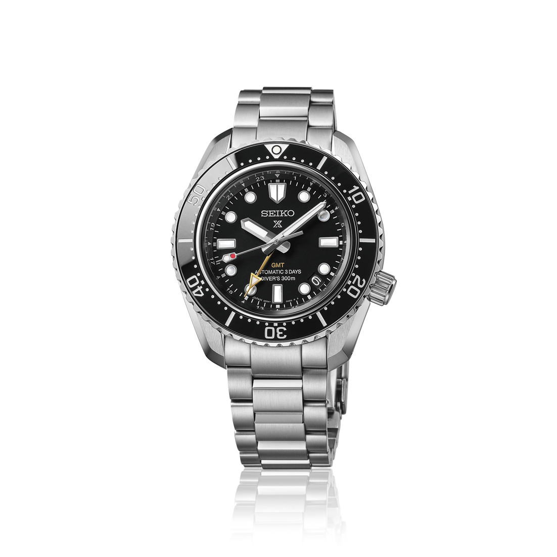 A Seiko Prospex 1968 Heritage Diver's GMT HBC002J1 automatic watch, showcasing its 42mm stainless steel case, a glossy black ceramic elapsed-time bezel, a matching oceanic black dial with large luminous markers, a gold-tone GMT hand, and a steel link bracelet.