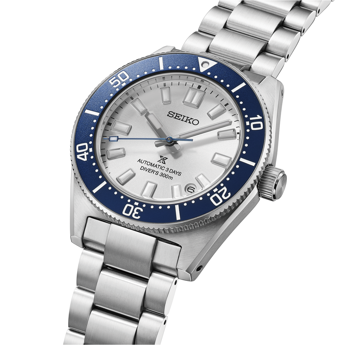 seiko prospex silvery white dial and blue bezel close up at an angle