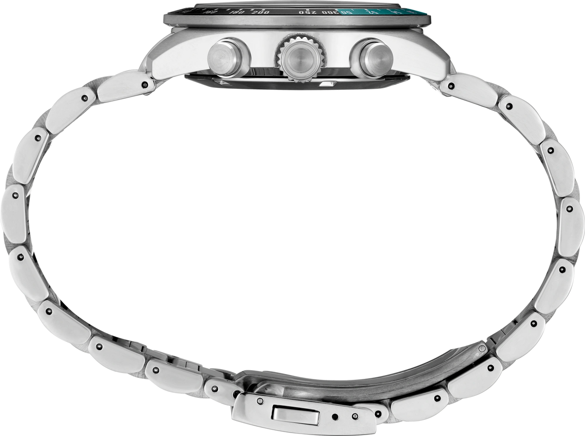 A Seiko stainless steel chronograph watch with a green dial and a black bezel featuring a green 24-hour marker ring, shown on a clean white background - side view