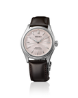 Seiko watch with black leather strap and soft pink dial on a white background