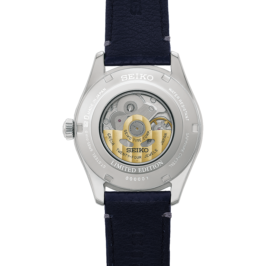 back of Seiko watch with blue strap and visible mechanical components on a white background