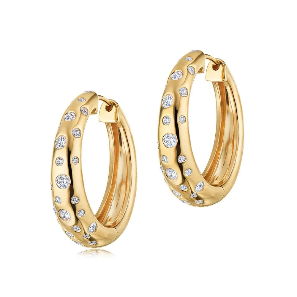 yellow old oval hoops with embedded diamonds on a white background