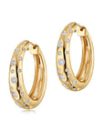 yellow old oval hoops with embedded diamonds on a white background