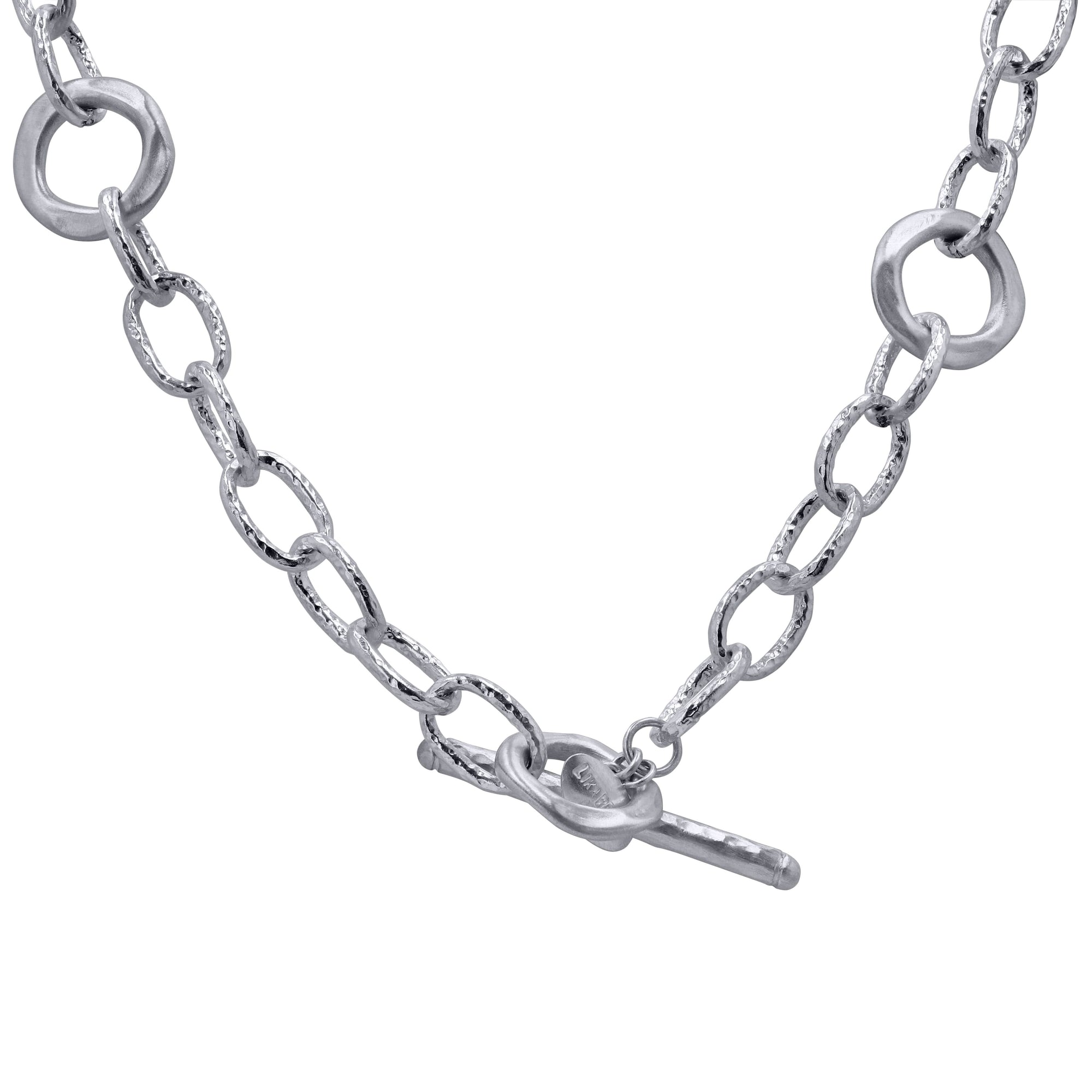 Silver chain necklace with a clasp on a white background