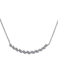 white gold curved necklace with small diamonds on a white background
