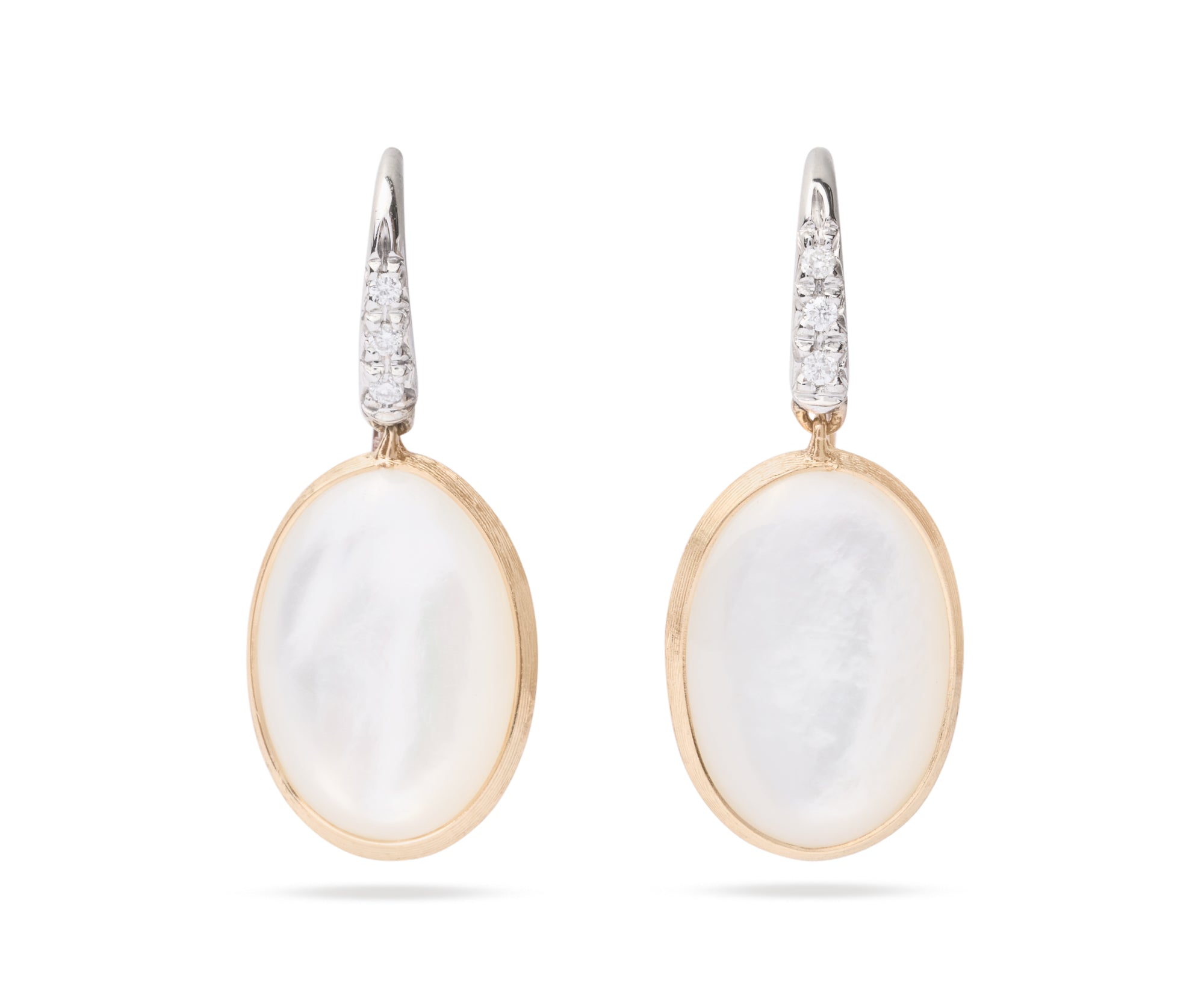 Pair of earrings with white mother of pearl stones and gold accents on a white background
