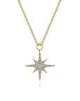 Gold necklace with a star-shaped pendant on a white background