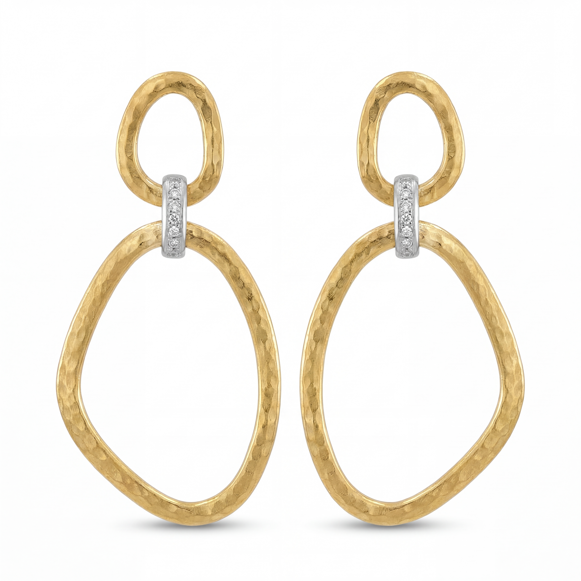 Gold earrings with a white background