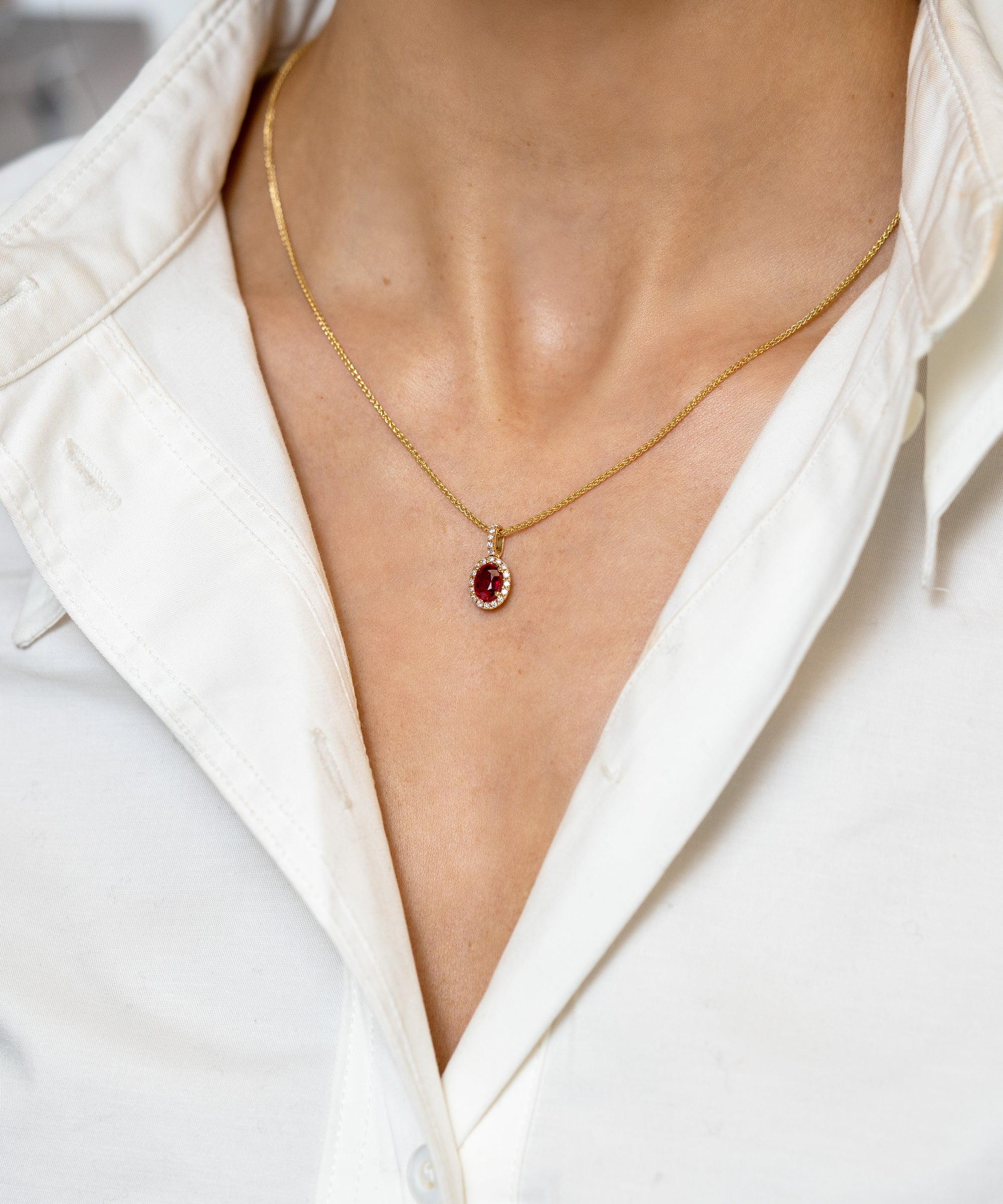 Ruby and Diamond Halo Oval Pendant Necklace - Skeie's Jewelers
