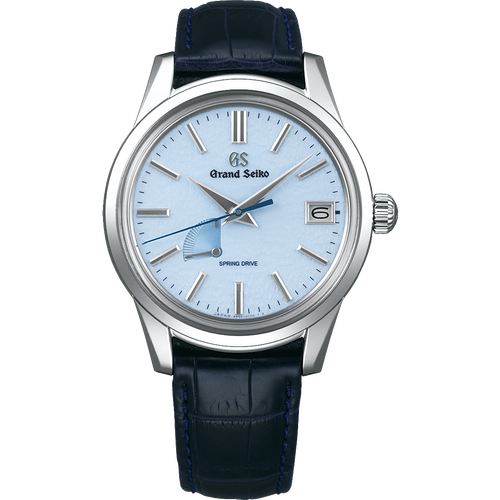 Studio product photograph of the Grand Seiko SBGA407 Elegance "Skyflake" watch, featuring a 40.2mm polished stainless steel case, an intricate snowflake textured light blue dial with a dark blue seconds hand, and a premium navy blue crocodile leather strap.