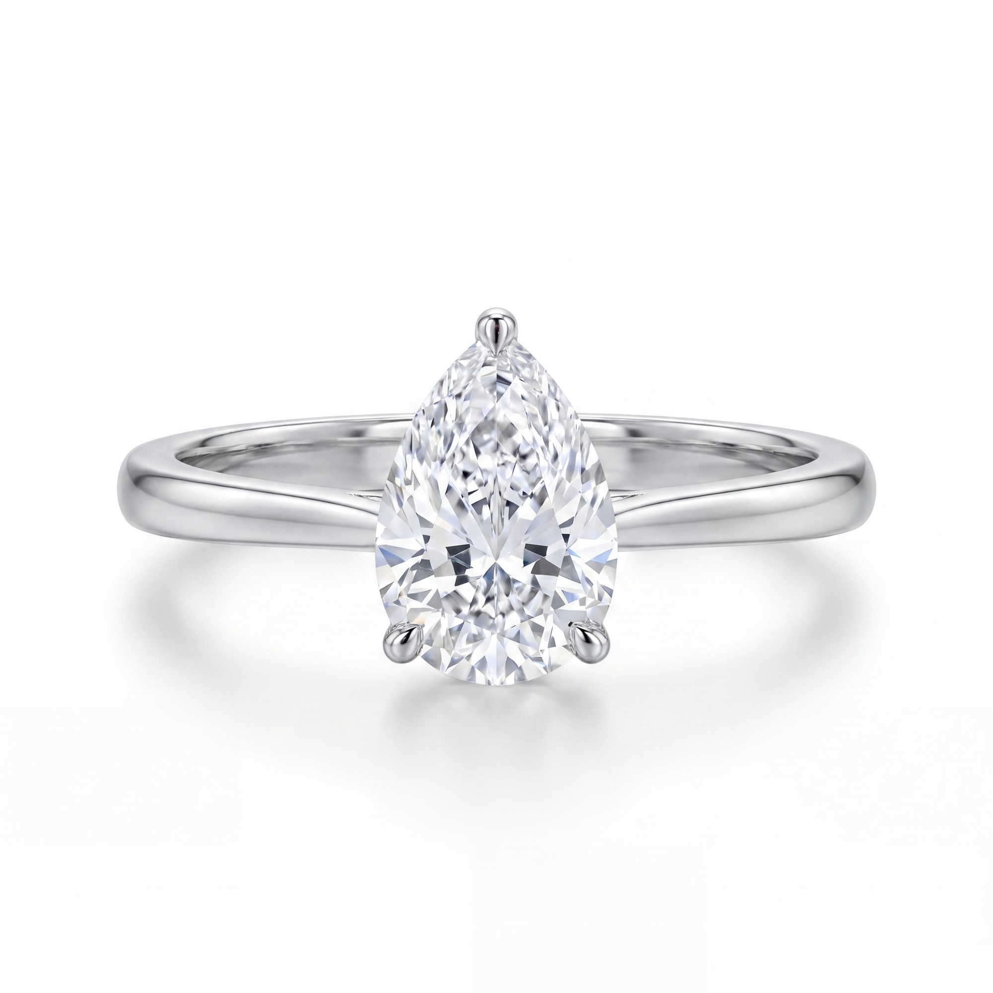 Lab Diamond ring with pear-shaped gemstone on a white background