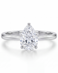 Lab Diamond ring with pear-shaped gemstone on a white background