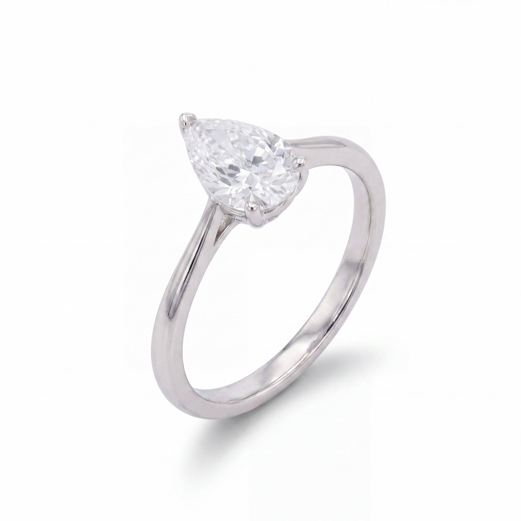 white gold  ring with a pear-shaped lab diamond on a white background
