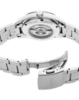 Silver Seiko watch with metal band on a white background back of watch