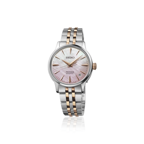 A limited edition women's Seiko Presage Cocktail Time SRPM06J1 watch, featuring a 34mm stainless steel case, a gradient pink and yellow mother-of-pearl dial with a date window, and a matching multi-link steel bracelet.