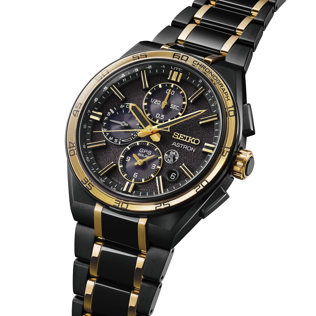 Black and gold Seiko Astron watch on a white background angled close up