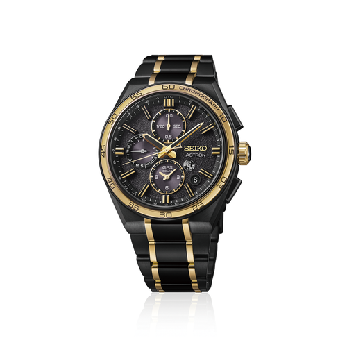 A limited edition Seiko Astron SSH186 GPS Solar Chronograph watch, showcasing its 44.1mm black titanium case, a gold-accented sapphire bezel, a textured black dial with four vertically arranged subdials, gold hands, and a matching black titanium bracelet