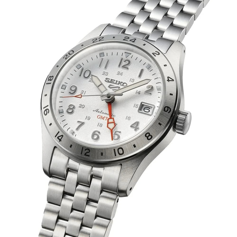 Silver Seiko watch with a white face on a white background- ANGLED