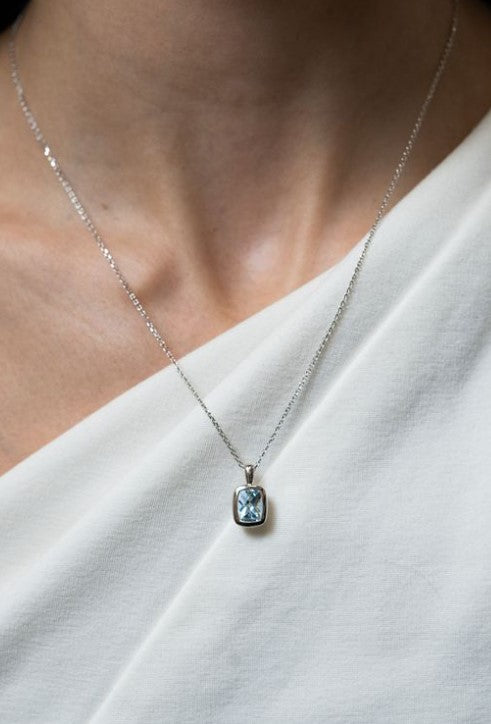 Elongated Cushion-Cut Aquamarine Bezel Pendant - Skeie's Jewelers