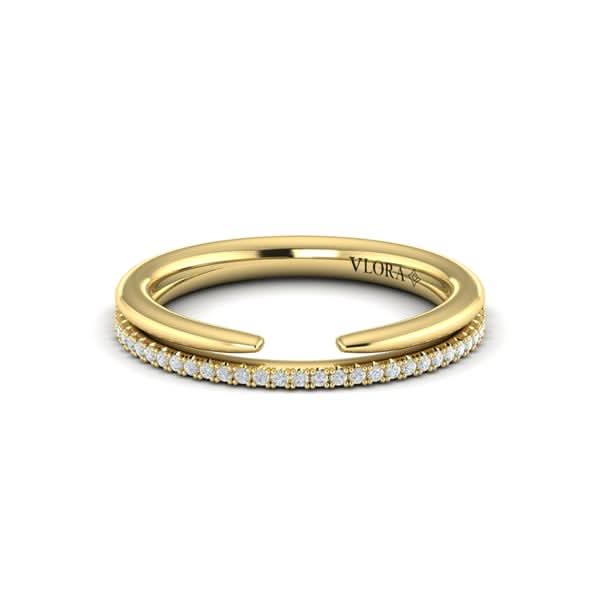Gold ring with diamonds on a white background