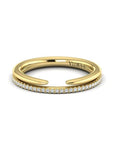 Gold ring with diamonds on a white background