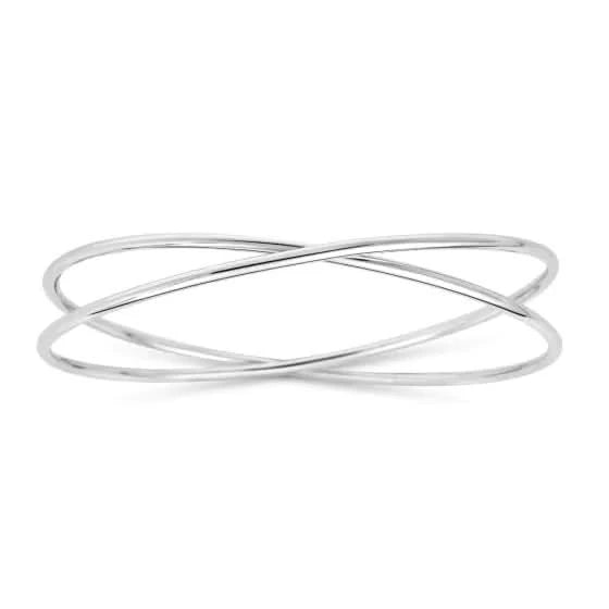 Silver bracelet with a crossover wire design on a white background