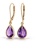 Side view of 14K yellow gold pear-shaped amethyst drop earrings with leverback closures