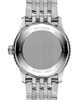 Silver watch back with Breitling brand engraving on a white background