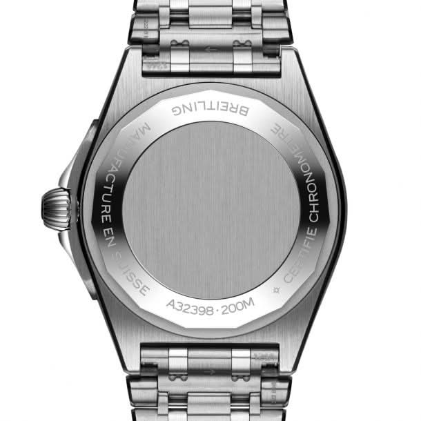 Silver Breitling watch face on a white background