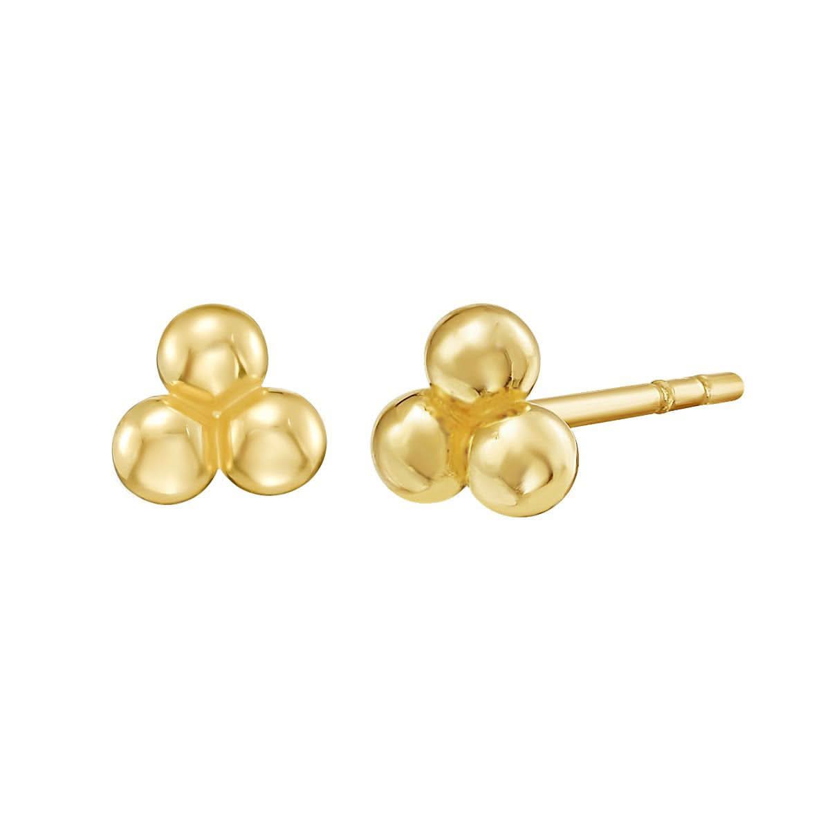 Pair of gold three-ball stud earrings on a white background